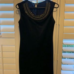 Cute navy dress, with beaded sequin neckline.